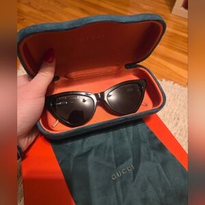 Gucci Black Cat-Eye Sunglasses with Gold Temples